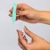 Pinzet for cleaning the nose, childish, with a cap, green color