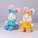 Soft toy "Bunny with a bow", color mix