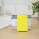 A dispenser for a detergent with a stand for the Raccoon sponge, a sponge included