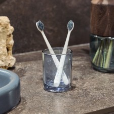 A glass for toothbrushes, 8x8x10 cm, blue color