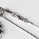 Piece "Date" Circle with a pattern, black and white color in silver, l = 70 cm