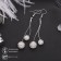 Hanging earrings with “Shambhala” rhinestones, white color in silver, 6.5 cm