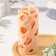 Aromatic decorative candle "openwork", beige, 6x12 cm, cinnamon