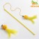 Domesticon-pound with a soft ball and feathers, yellow