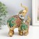 Polystone souvenir "Elephant with an elephant - Red -green ass with rubies" 13.5x8.5x15.5 cm