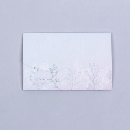 An envelope for a certificate with embossing "Happiness is" 10.5 x 7-2