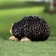 Garden figure "Hedgehog is heating" 18x10x10cm