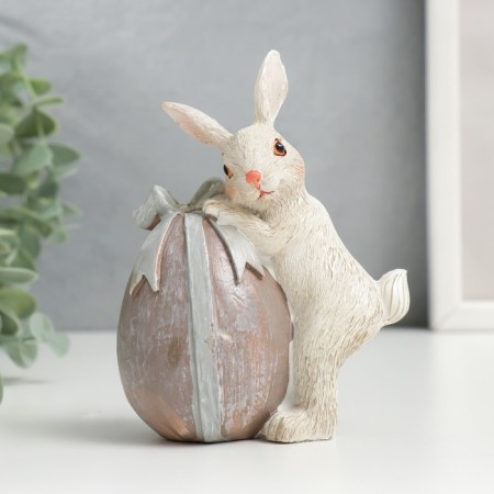Polystone souvenir "Rabbit with an testicle with a bow" 11x5.5x8.5 cm