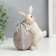 Polystone souvenir "Rabbit with an testicle with a bow" 11x5.5x8.5 cm