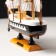 Souvenir Small Small “Three -Mature”, black sides with a white strip, white sails, 20 × 5 × 19 cm