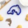Dolphin cookie uniform, 8 × 6 cm, blue color