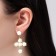 Earrings Assorted "Flowers" in crosses, white color in gold