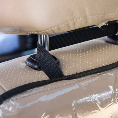Protective cape on the back of the car seat, 605x390 mm, PVC-2
