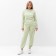 Women's costume (sweatshirt, trousers), pale green color, size 54