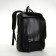 City backpack on a zipper, black color