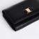Women's wallet on the button, black color