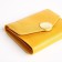 Women's wallet on the button, yellow color
