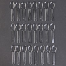 Tablespoons are plastic, in the set 24 pcs., The color is transparent