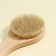 Massage brush for the body of the share, with a pen, natural bristles