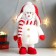 Interior doll "Snowman in a red hat with a ear with a bomb" 40x17x16 cm