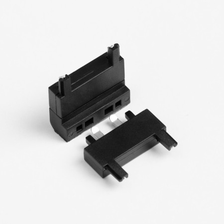 The ultra-thin connector for the busbar (ceiling-wall) is black 2.6x2.6x2.6 cm-1