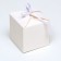 The box is folding, square, white, 8 x 8 x 8 cm,