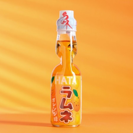 Drink of carbonated Ramune with an orange taste, 200 ml