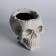 Figure candle in concrete "Crying Skull", black