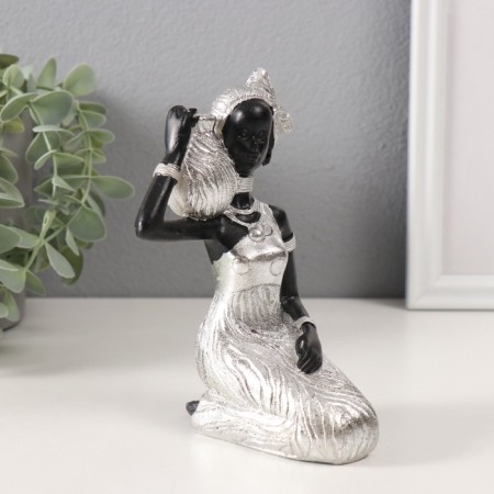 Polystone souvenir "African in a dress with leaves, with a jug, sits" silver 10.5x9x16 cm