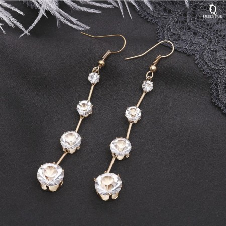 Hanging earrings with rhinestones "Drop" path, white color in gold, 6.2 cm-1