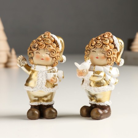 Polystone souvenir "Baby in a gold caftan and cap, with a bird/gift" Mix 4x5x10 cm 94988