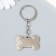 Metal keychain, enamel "Bone with paws" mix 4x3 cm