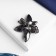 Brooch "Flower" Sea star, colored in gray metal