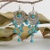 Earrings "turquoise world" circle and 5 paths of beads, blue color in black silver