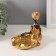 Souvenir Polystone stand "African Adeol in a dress with hem" Gold 11x16x14 cm