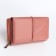 Women's wallet on the button, pink color