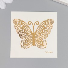 Tattoo on the body gold 