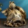 The piggy bank "Snake with a bag" Black gold, 25x27x23cm