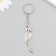 Metal key "parrot" silver 1.6x5.5 cm