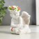 Polystone souvenir "Snowthrough angel with a rose, in a wreath of roses" MIXs 8x7.2x6 cm