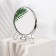 The desktop mirror is a suspended “circle”, bilateral, with an increase, D mirror surface 14 cm, silver color