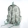 School backpack from textiles on a zipper, 4 pockets, green color