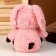 Soft toy "Dog" in a hare costume, 30 cm, pink color