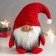 Interior doll "Grandfather Frost in a huge red cap" 22x15x10 cm