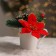 New Year's composition "In a mug with a flower"