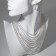 Set 2 objects: earrings, necklaces of 12 rows “waterfalls”, white color in silver, 52 cm