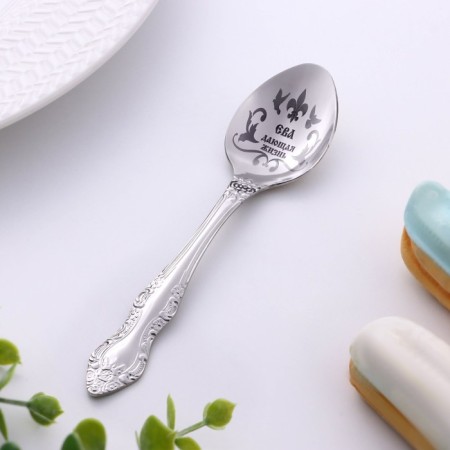 A spoon is registered, tea, with an engraving "Eva", h = 14-1