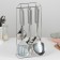 A set of kitchen supplies "metallic", 6 items, on a stand