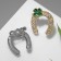Brooch "Horseshoe" for good luck with clover, color mix (indivisible packing 12 pcs., Price per pcs.)