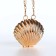 Female bag on a magnet, gold color